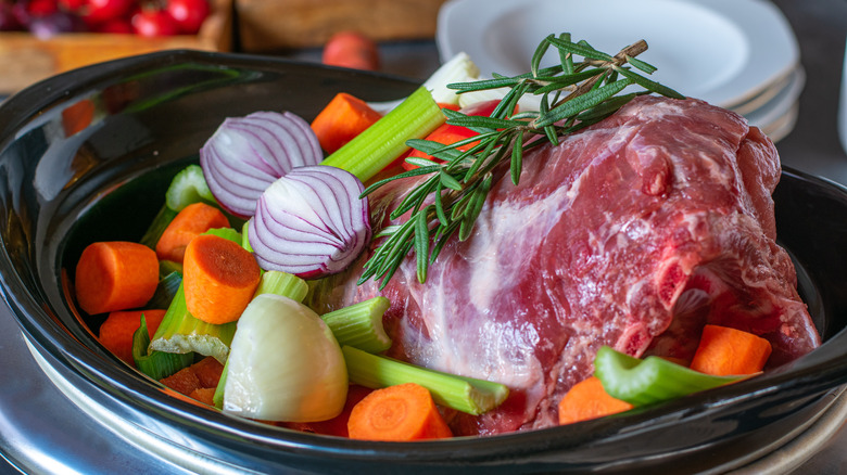 slow cooker with raw ingredients