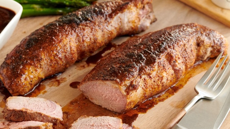 sliced meat on cutting board