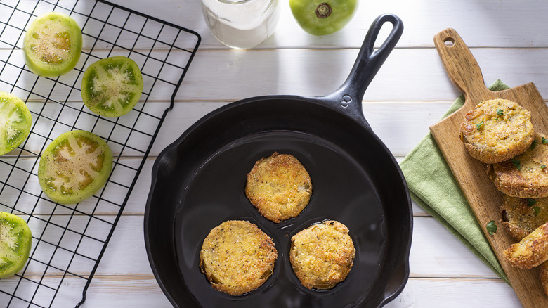 Fried green tomatoes in pan