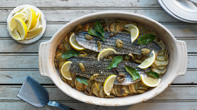 Striped bass in a casserole dish