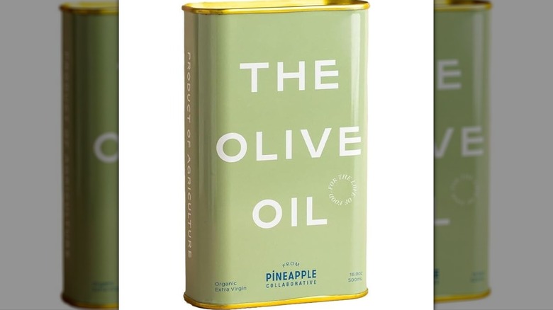 A green tin of olive oil