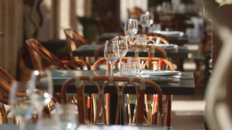 set tables at restaurant