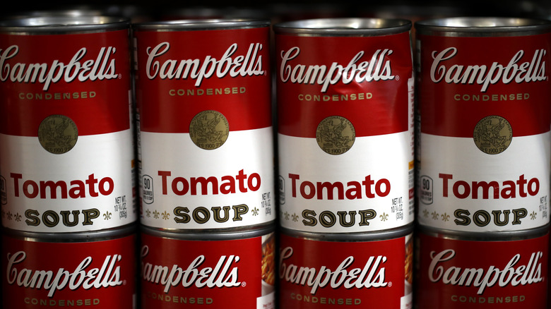 Cans of Campbell's condensed tomato soup.