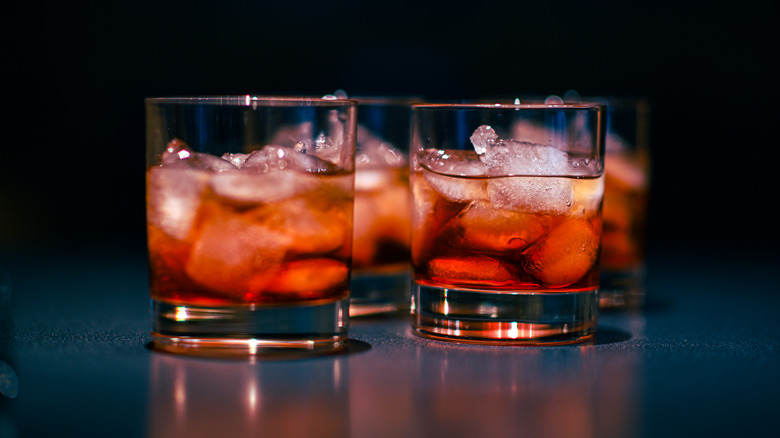 Four Negronis without garnishes