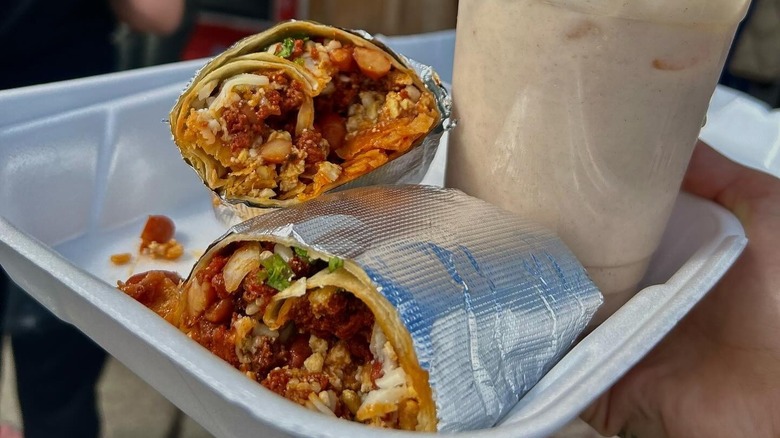 A breakfast burrito cut in half from Tacos Villa Corona in Los Angeles