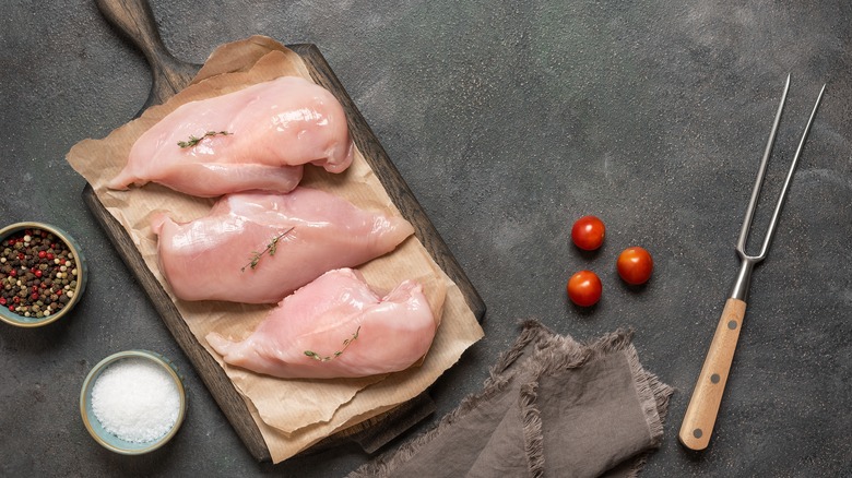 Chicken breasts on a cutting board