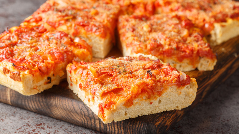 The classic Sicilian version of sicilian pizza, sliced