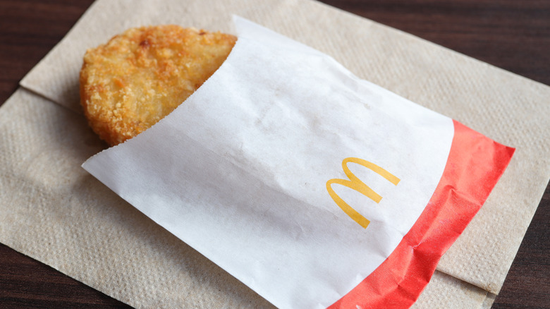 McDonald's hash brown in a paper bag