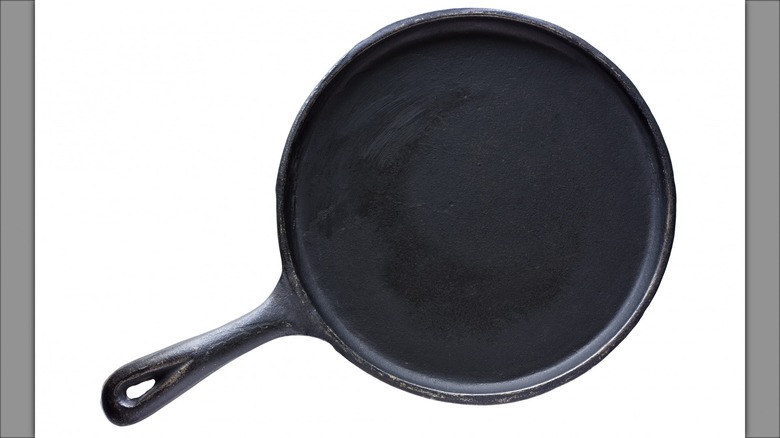 Cast iron pan on white background