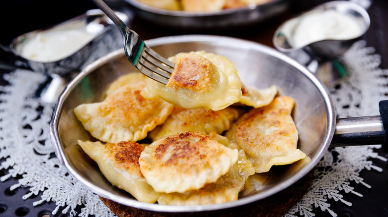 A bowl of nicely sautéed pierogi