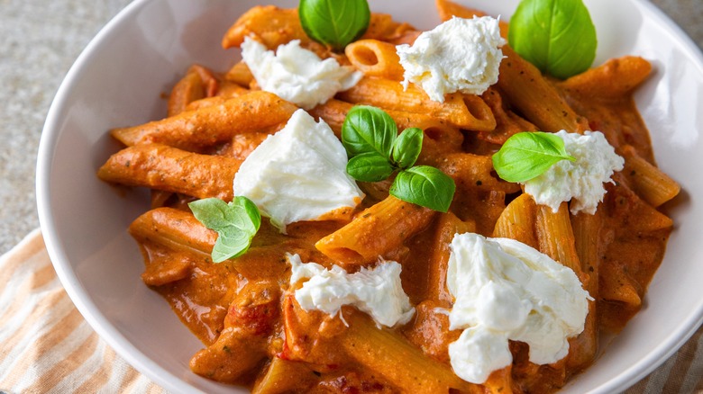 pasta topped with burrata