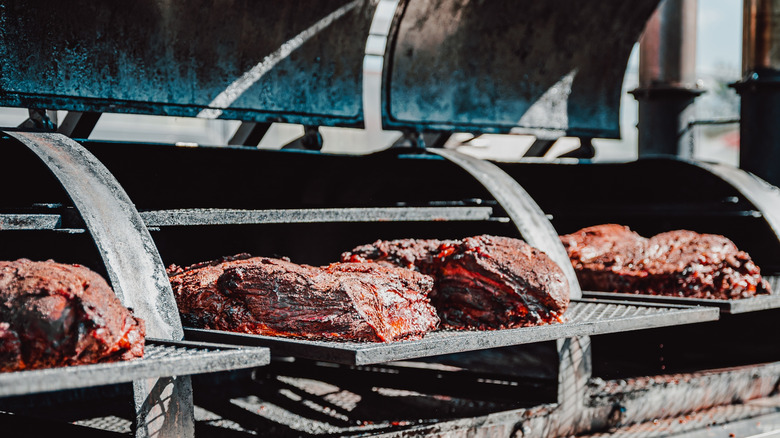 Briskets on a barbecue smoker