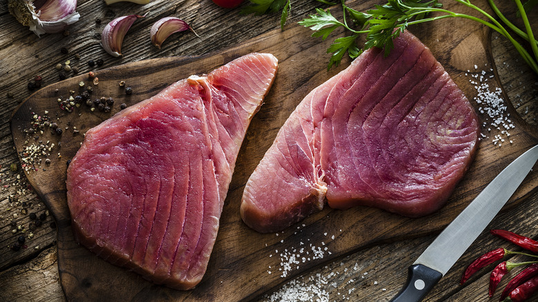 Tuna steaks on a cutting board