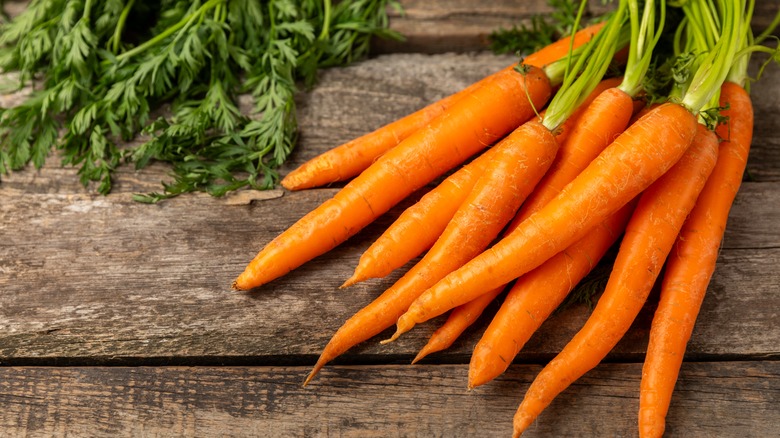 Carrots on wood