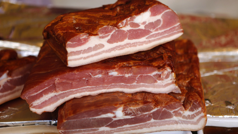 Uncooked slabs of bacon