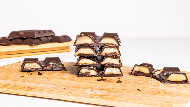 Stack of halved chocolate bars with the filling oozing out