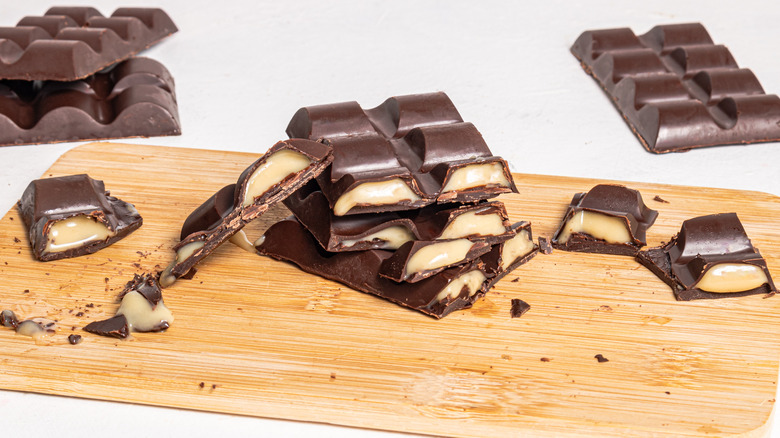 Stack of halved chocolate bars with the filling oozing out