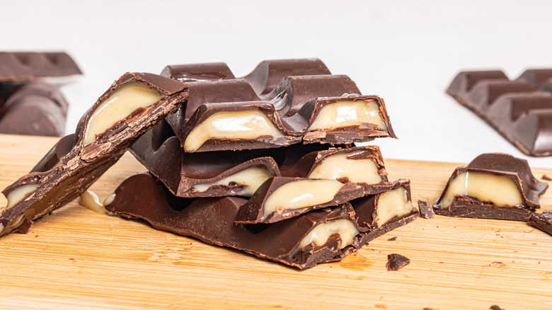 Stack of halved chocolate bars with the filling showing