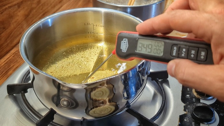 thermometer in pot of oil