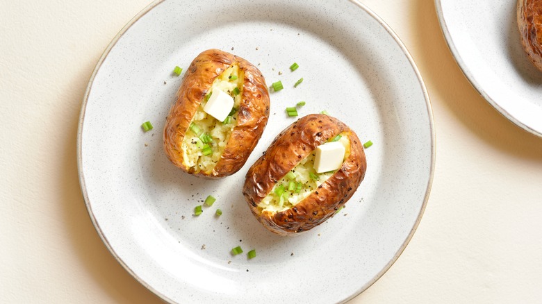 baked potatoes with butter