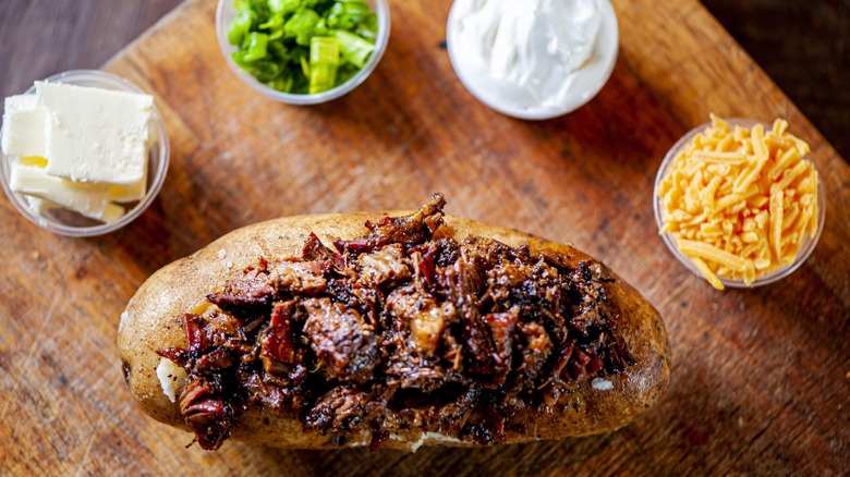 barbecue stuffed potato with the fixin's