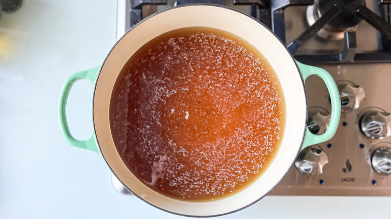 Brown sugar and kosher salt brine in pot on stove