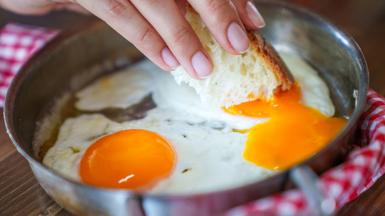 Toast dipped into egg pan