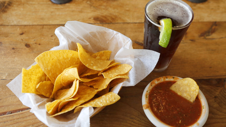 tortilla chips, salsa and beer