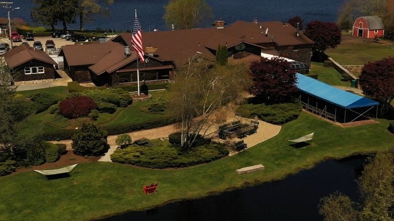 Arial shot of the Nordic, including the lake and a barn