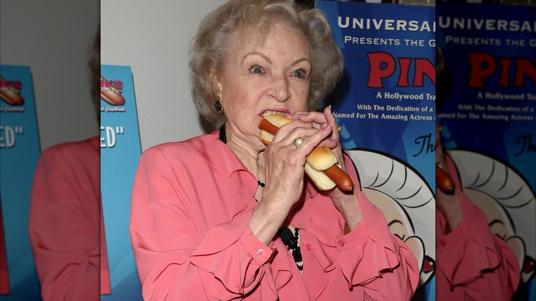 Betty White eating hot dog