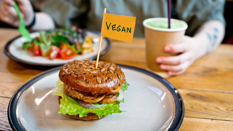 Vegan burger with a sign