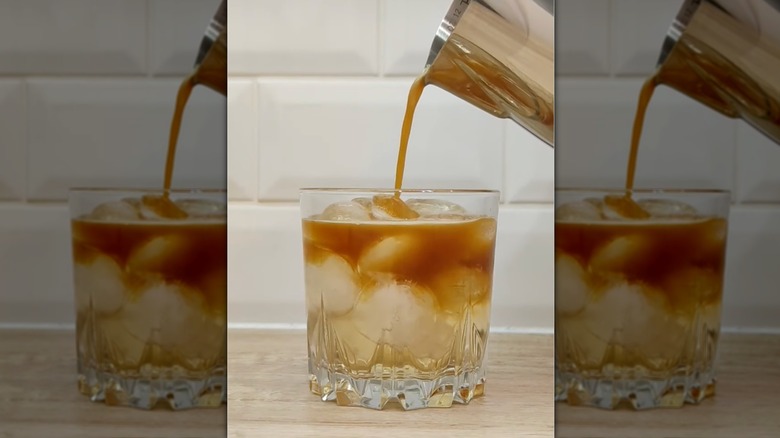 Espresso poured into a glass of ginger ale.