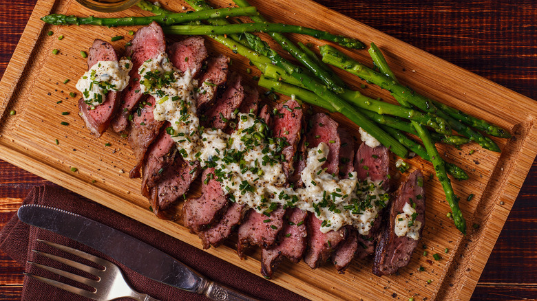 Steak and asparagus with melted blue cheese