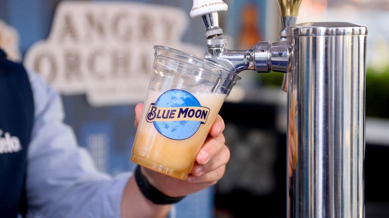 Pouring Blue Moon from tap