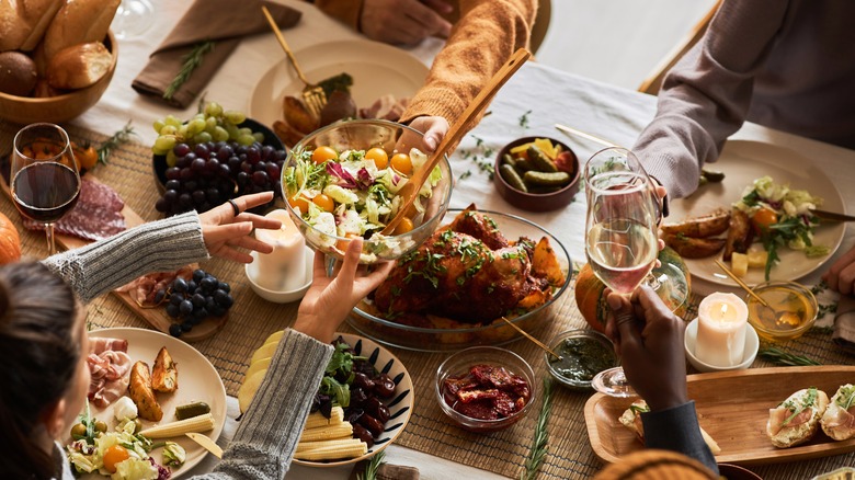 a table with multiple dishes being served