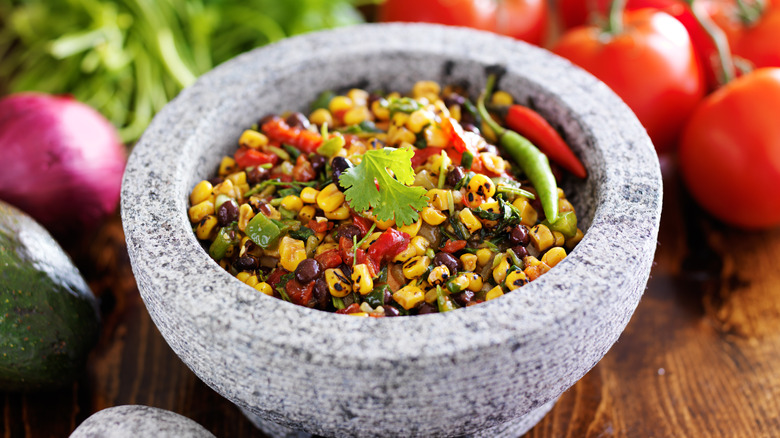 Corn salsa in a molcajete