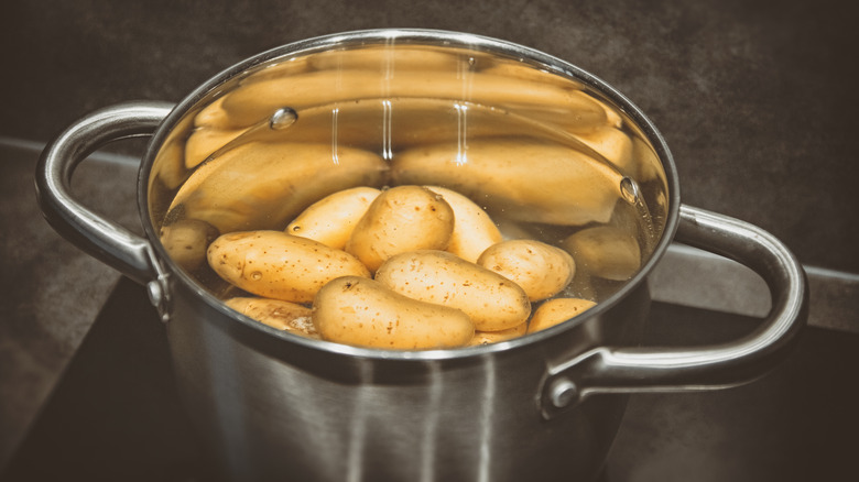 potatoes soaking within a pot