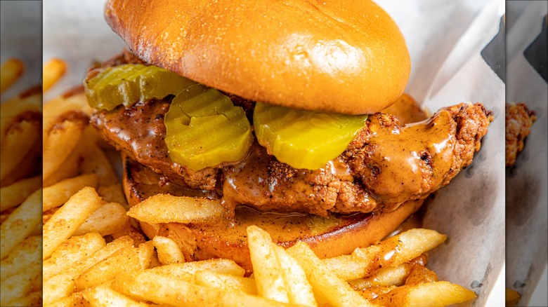 Close-up of sweet pickles on fried chicken sandwich