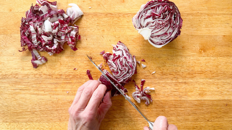 Slicing radicchio on cutting board