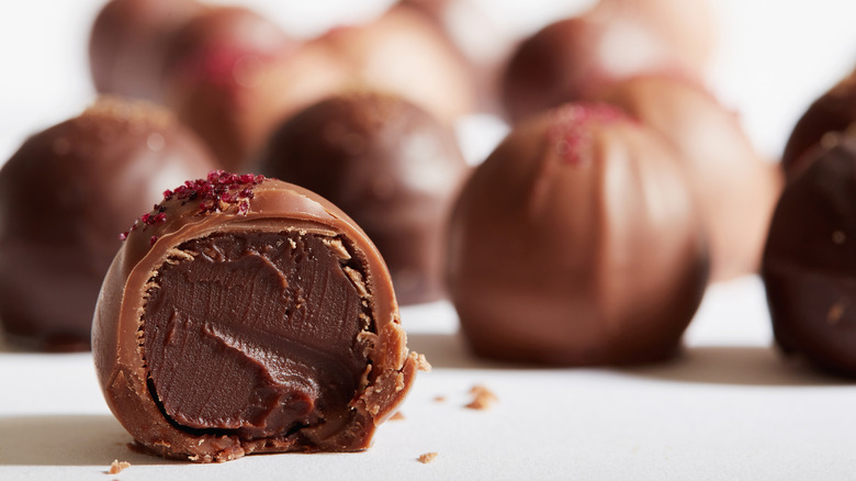 Chocolate truffle sliced in half