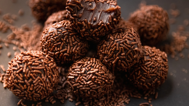 Pile of Brigadeiros, one bitten