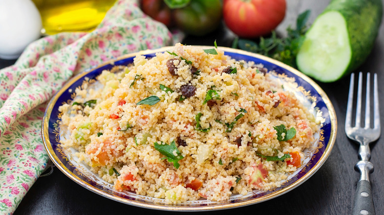 grain dish with vegetables on plate