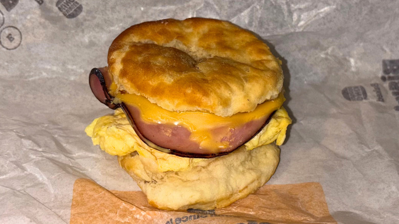 Ham, egg, and cheese biscuit breakfast sandwich
