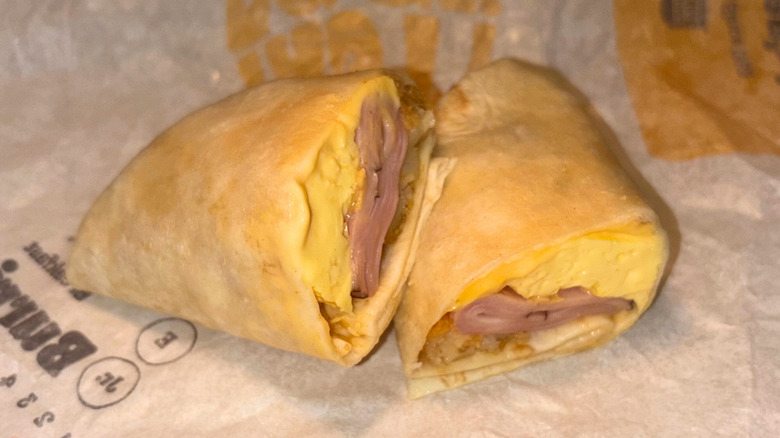 Ham, egg, cheese, and hash brown breakfast burrito