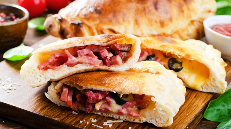 Calzone with cheese, ham, vegetables