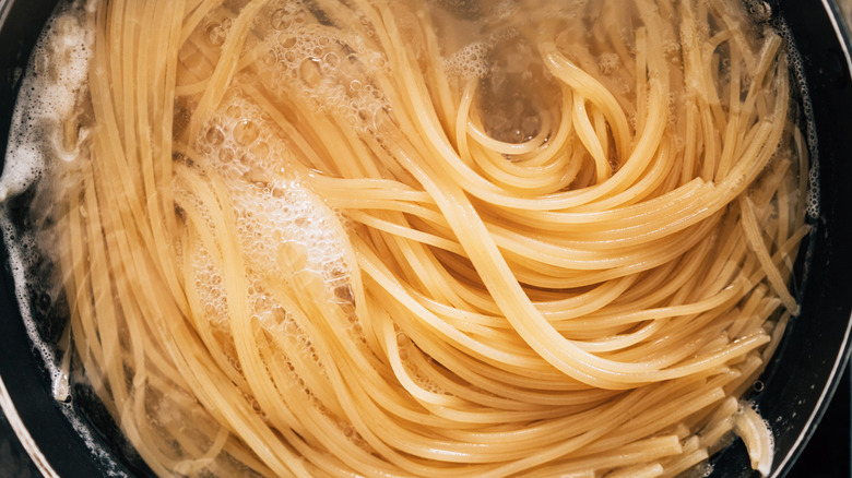 Spaghetti boiling in water