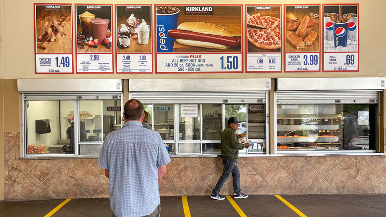 A line of people waiting to order at Costco's food court