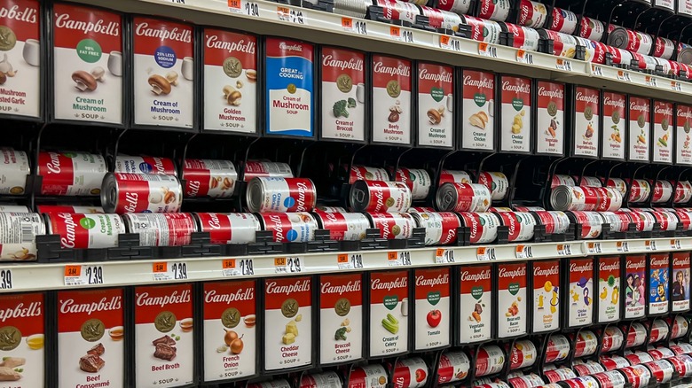 Campbell's soup cans on a store shelf