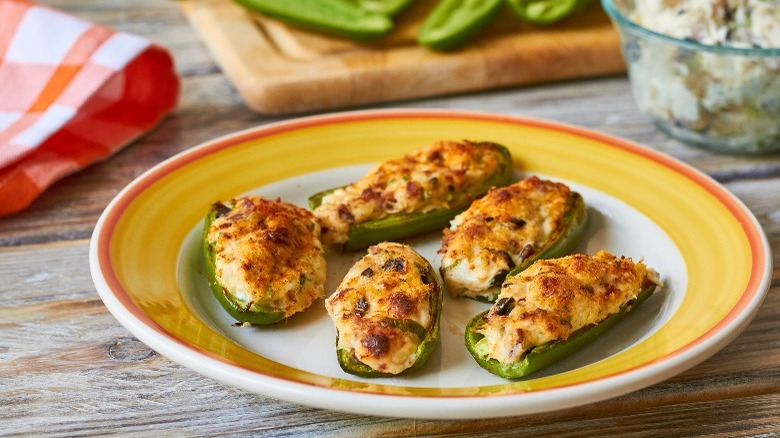 cream cheese-stuffed jalapeño poppers on a platter