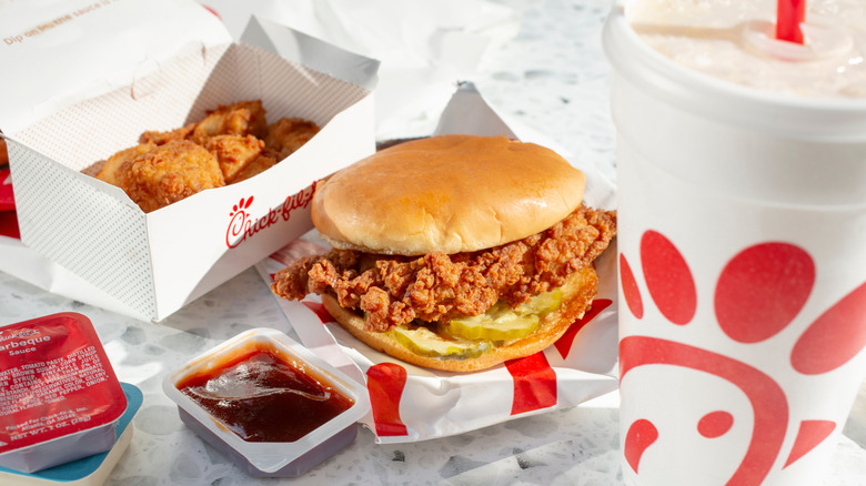 Chick-fil-A sandwich, nuggets, sauces, and drink